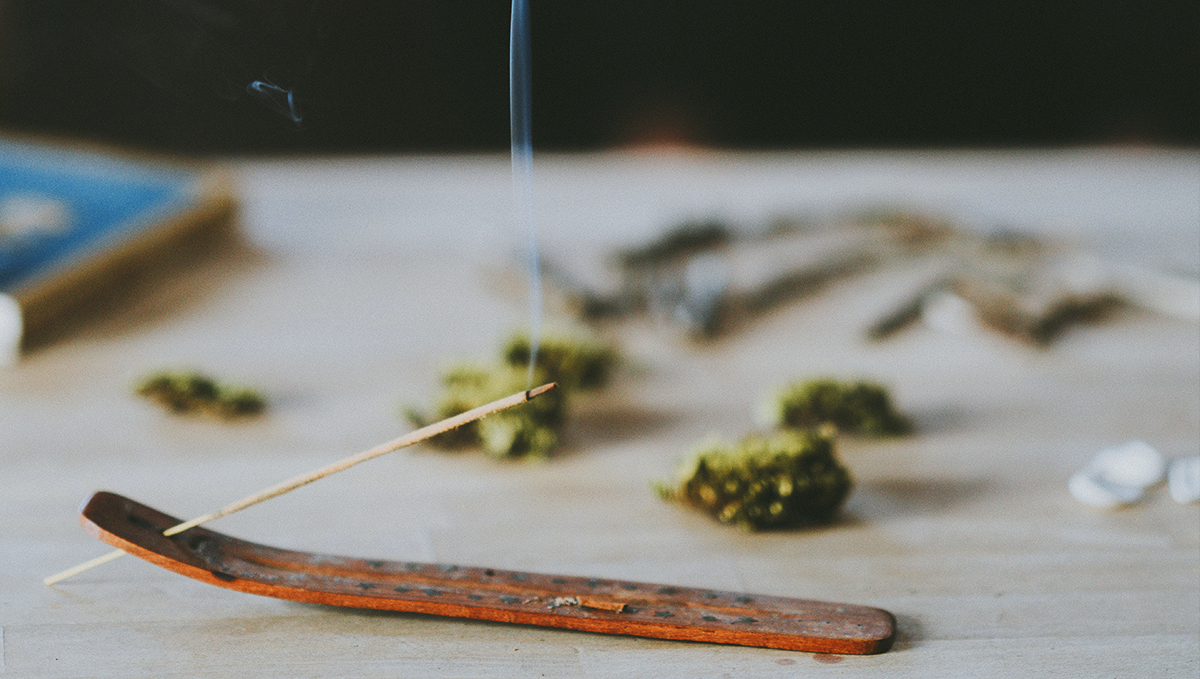 Light some candles or incense to get rid of plants smell.