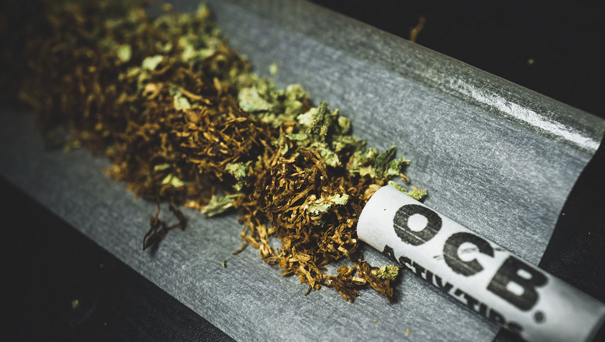 The contents of a spliff (weed and tobacco) laid on a piece of rolling paper