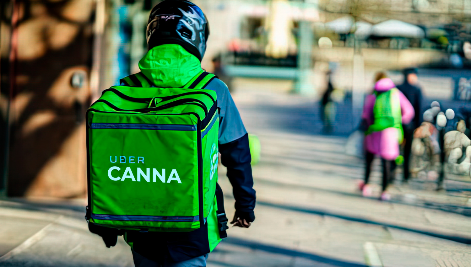 Uber Eats Will Now Have Weed on the Menu But Only in Ontario, Canada: A delivery courier seen from behind with a green backpack and a biking helmet